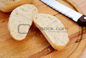 Closeup of a freshly cut bread roll