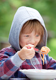 Boy Eating Pasta
