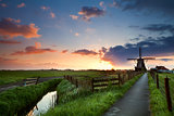 sunrise behind windmill, Netherlands