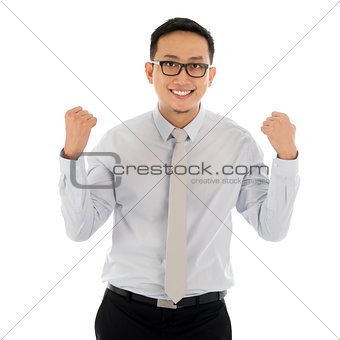 Asian business male celebrating success