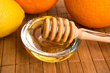 fresh honey with lemon and orange fruits