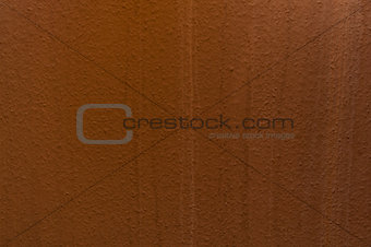 brown structural painted wallpaper on the wall