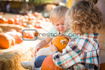 Young Family Enjoys a Day at the Pumpkin Patch