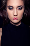 dark girl portrait with blue eyes