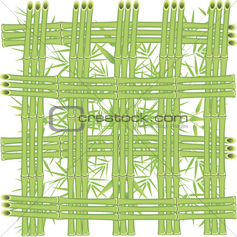 Grid of bamboo stalks on a background of green leaves