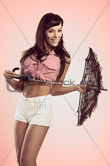 sensual brunette woman with parasol 