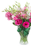 Pink eustoma flowers in glass vase