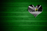 Heart Shape cut on Green Wooden Wall