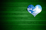 Heart Shape cut on Green Wooden Wall