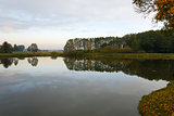 Autumn landscape with water and reflection