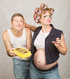 Pregnant Woman Grabbing Man