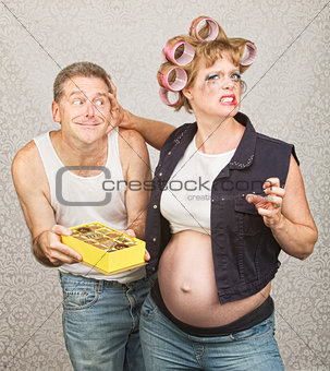 Pregnant Woman Grabbing Man