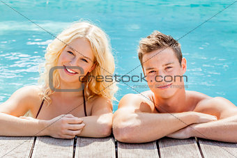 young couple at the pool