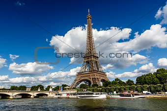 Eiffel Tower and Seine River with White Clouds in Background, Pa