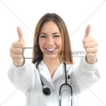 Beautiful female doctor with both thumbs up