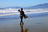 Surfer on a coastline
