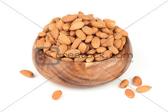 Heap of peeled almond nuts isolated on white