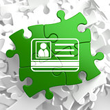 ID Card Icon on Green Puzzle.