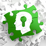 Psychological Concept on Green Puzzle Pieces.