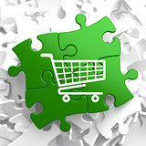 Shopping Cart Icon on Green Puzzle.