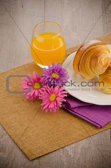 Croissants with orange juice 