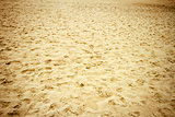  Footsteps on a beach sand   