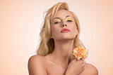 beauty blonde girl with flower