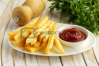 Traditional French fries with tomato ketchup