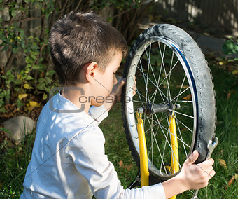 Kid who fix bikes