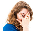woman hiding face laughing timid