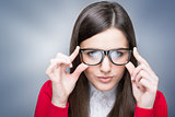 Confident businesswoman with nerd glasses