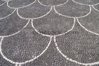 paved street with scalloped design