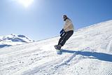 Snowboarding in the sun stock photo