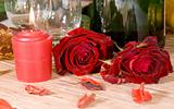 scarlet sweetheart rose and candle