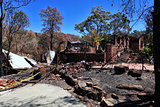 After bushfire, homes razed to the ground.