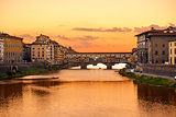 Ponte Vecchio sunset view over Arno  river in Florence