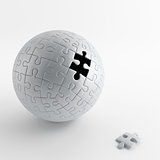 ball of gray puzzle with a hole of pulling out one piece