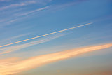 Aircraft track in the evening sky