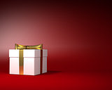 White Gift Box with Gold Ribbon and Bow on the Red Background