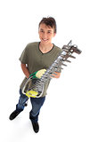 Smiling young male with garden tool