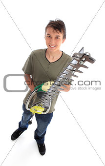 Smiling young male with garden tool
