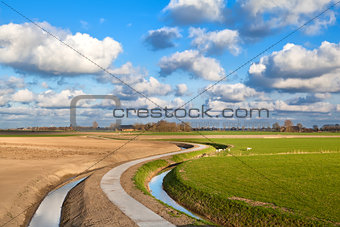 curved road for bikes under blue sky
