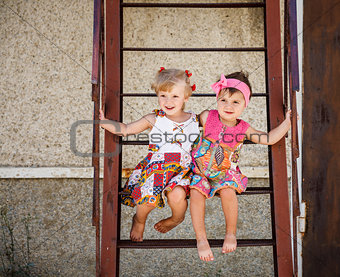 two little girls outside