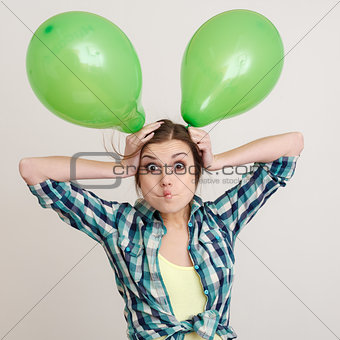 young woman with balloons