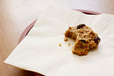 Oatmeal raisin cookie with a bite taken