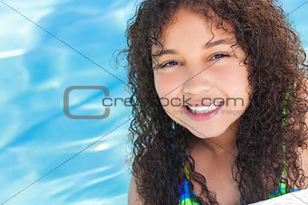 African American Mixed Race Girl Child In Swimming Pool