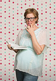 Confused Pregnant Woman Reading