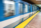 Moving subway train and Motion blur with an empty subway platfor