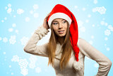 pretty girl with red christmas hat  