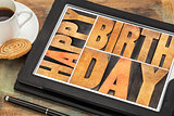 Happy birthday on digital tablet